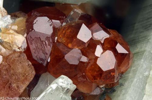 Grossular var. Hessonite
Testa Ciarva, Balme, Ala Valley, Lanzo Valley, Sesia-Lanzo zone, Torino Province, Piedmont, Italy
7.31 mm Hessonite cluster (Author: Matteo_Chinellato)