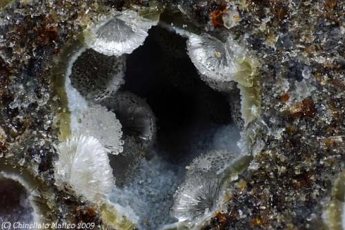 Offretite
Fittà, Soave, Verona Province, Veneto, Italy
1.32 mm geode with some Offretite acycular crystals under ball formation (Author: Matteo_Chinellato)