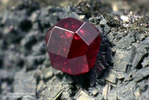 Cuprite
Madonna di Fucinaia (Madonna della Fucinaia; slag locality), Campiglia Marittima, Livorno Province, Tuscany, Italy
0.67 mm single cubeochtaedron Cuprite crystal (Author: Matteo_Chinellato)