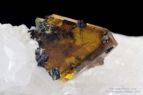 Sphalerite, Colusite, Enargite
La Facciata quarry, Carrara, Apuan Alps, Massa-Carrara Province, Tuscany, Italy
3.66 mm orange Sphalerite crystal in epitaxy with Colusite and Enargite (Author: Matteo_Chinellato)