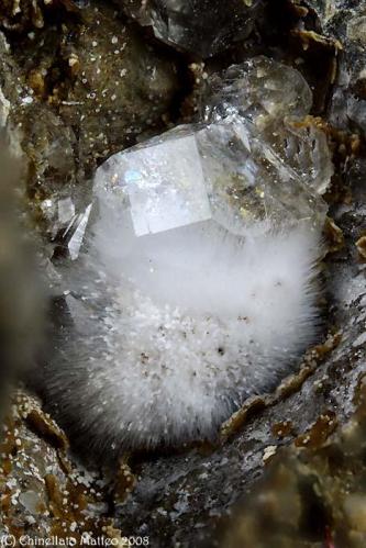 Analcime
Vitiello Quarry (Cava Vitiello), Terzigno, Mt Vesuvius, Somma-Vesuvius Complex, Naples Province, Campania, Italy
Little Analcime crystal over a not well know Zeolite group tuft mineral. All measure 2.5 mm (Author: Matteo_Chinellato)