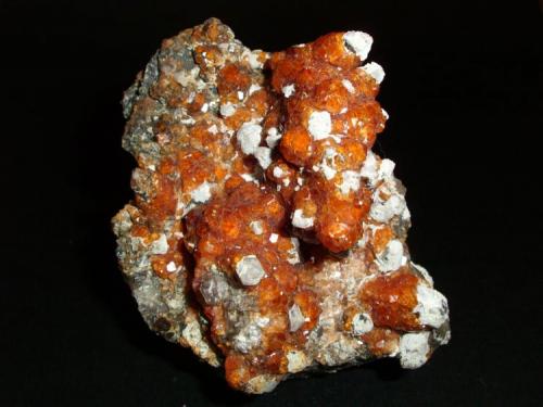 Spessartina (Espesartina) (Granate) sobre Cuarzo y matriz de Ortosa
Tongbei, Yunxiao Co., Zhangzhou, Fujian, China
9.8 x 9.7 x 5.3 cm (Autor: Daniel Olivares)