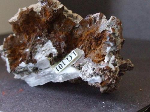 Dolomite with Carbonate
Beckermet Mine, Egremont, Cumbria, England, UK
5 x 3.5 x 2 cm
Showing Greenbank label with tabular Baryte (Author: nurbo)