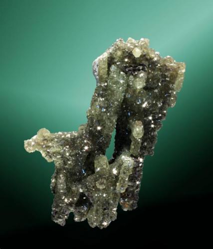 Smithsonita
Touissit, Oujda, Marruecos
6,8x3,9,2,2 cm.
Crecimiento estalactítico de cristales romboédricos, con las aristas y caras curvas.
Ejemplar de 1997 (J. Fabre) (Autor: Carles Curto)