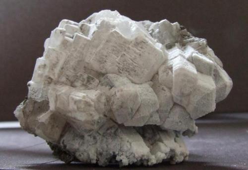 Witherite with surface alteration to Baryte
Haggs Mine, Nentsberry, Alston, Cumbria.
44 x 36 mm (Author: nurbo)