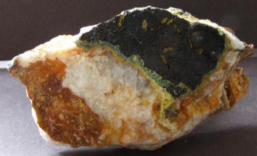 Plumbogummite, Mimetite, Quartz, Limonite and  Manganese Oxides
Dry Ghyll, Caldbeck Fells, Cumbria.
85 x 30 mm (Author: nurbo)