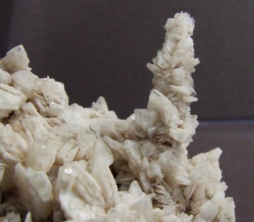 Baryte
Eller Beck, Askrigg, North Yorkshire.
Stalactite (Stalagmite?)  measures 25 mm approx (Author: nurbo)