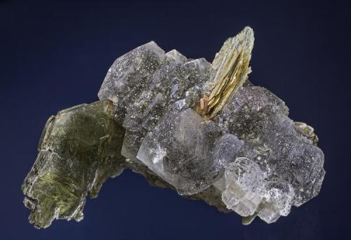 Calcite included with pyrite with Muscovite
Rist Mine, Hiddenite, Alexander Co., North Carolina, USA
6.3 x 6 cm. (Author: am mizunaka)