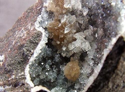 Thomsonite, Calcite and Chabazite
Craighill Quarry, Co Antrim, N. Ireland, UK
FOV 15 x 12 mm (Approx) (Author: nurbo)