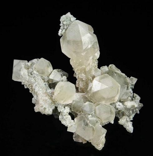 Quartz
Huanggangliang Iron Mine, Kèshíkèténg Qí, Chifeng, Inner Mongolia A.R., China

101 x 82 x 76 mm

This is an excellent specimen with intergrown crystals of sceptered Quartz to 67 mm long, with well developed, dipyramidal heads.  The Quartz are translucent, and have sharp faces and edges, and the caps of many are preferentially frosted.  Small dipyramidal Quartz have grown on the the shafts of the Quartz.  Minor Arsenopyrite crystals accent the specimen.  Only very minor chipping is present on a few of the Quartz. (Author: GneissWare)