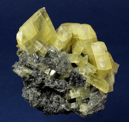 Barite

SSX (South Saval Extension) Mine, Elko County, Nevada, USA

95 x 91 x 73 mm

Translucent, pale-golden, lustrous, thick tabular Barite crystals, the largest measuring 42 x 8 mm, are perched on a contrasting sulfide matrix. Mined in 2001. (Author: GneissWare)