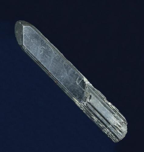 Stibnite

Ichinokawa Mine, Saijo, Ehime Prefecture, Shikoku, Japan

87.0 x 14.0 x 12.0 mm

This single, sharp 87 mm Stibnite crystal has well-developed parallel striations and a steep pyramidal termination. The other termination is ragged. As typical of specimens from this classic Japanese locality, there are a few minor nicks, but overall the Stibnite is in very good condition. This is from the notable collection of California collector Earl Calvert (1904-1964). (Author: GneissWare)