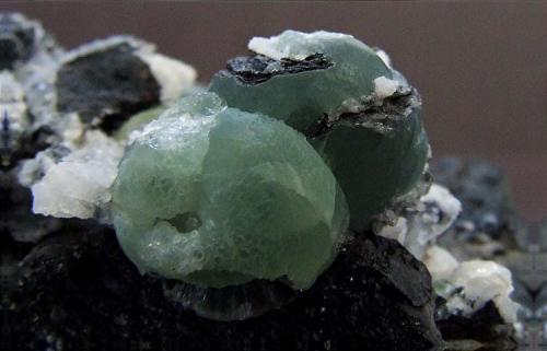 Wavellite
 Laharran Quarry, Minane Bridge, Tracton, Co Cork, Ireland
Wavellite balls to 10 mm (Author: nurbo)