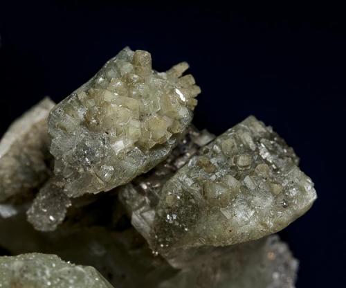 Calcite, Quartz, Muscovite
Rist Mine, Hiddenite, Alexander Co., North Carolina, USA

Detail (Author: am mizunaka)