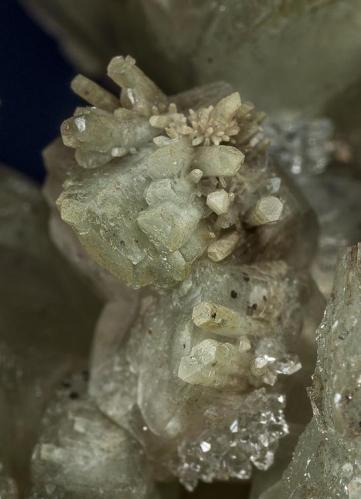 Calcite, Quartz, Muscovite
Rist Mine, Hiddenite, Alexander Co., North Carolina, USA

Detail (Author: am mizunaka)