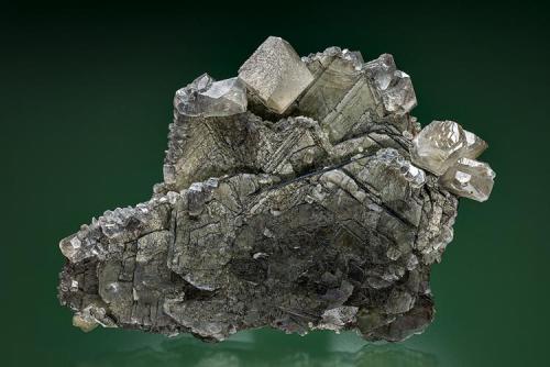 Calcite on Muscovite
Rist Mine, Hiddenite, Alexander Co., North Carolina, USA
8.5 x 6.3 cm. (Author: am mizunaka)