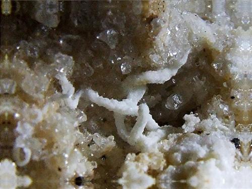 Calcite with Aragonite (Var Floss Ferri(?)
Small unnamed dump close to Dam Rigg Level, Whaw, Arkengarthdale, North Yorkshire, England, UK.
FOV 10 x 10 mm Approx (Author: nurbo)