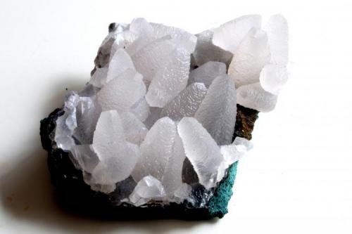 Calcita.
Iraí, Alto Uruguai Region, Rio Grande do Sul, Brasil.
Medidas pieza: 6,1x5,2x2,6 cm, Medidas cristal mayor: 1,4x0,9x0,9 cm. (Autor: Sergio Pequeño)