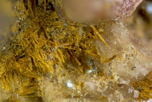 Goethite
Poudrette quarry (Demix quarry; Uni-Mix quarry; Desourdy quarry; Carrière Mont Saint-Hilaire), Mont Saint-Hilaire, Rouville RCM, Montérégie, Québec, Canada
Goethite is the golden needles (Author: Doug)