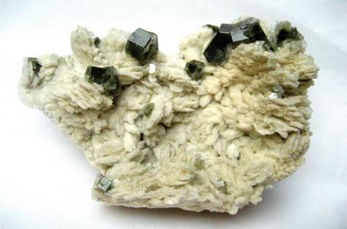 Fluorapatite on albite
Sapo mine, Ferruginha, Conselheiro Pena, Doce valley, Minas Gerais, Brazil
Specimen size 11 cm, largest apatite 1,5 cm (Author: Tobi)