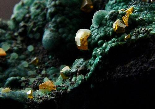 Wulfenite on Malachite on Goethite, with Calcite..
Whim Creek, Pilbara Region, Western Australia, Australia.
20 x 15 mm approx (Author: nurbo)