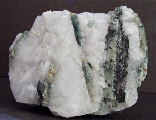 Apatite, Wolframite, Arsenopyrite.
Carrock Mine, Carrock Fell, Caldbeck Fells, Cumbria, England, UK.
75 x 55 mm (Author: nurbo)
