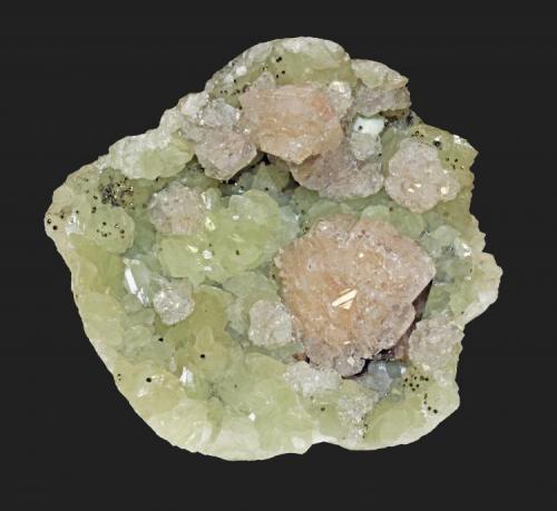 Apophyllite and datolite
Millington Quarry, Bernards Township, Somerset County, New Jersey, USA
9.2 x 7.6 cm
Pink apophyllite rosettes to 3.8 cm on datolite with pyrite and calcite (Author: Frank Imbriacco)