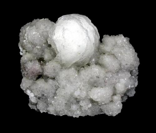 Stellerite
Braen Quarry, Haledon, Passaic County, New Jersey, USA
6.2 x 5.4 cm
A 3.3 cm stellerite sphere on a crystallized stellerite druse (Author: Frank Imbriacco)