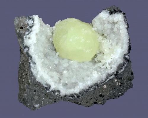 Prehnite
Millington Quarry, Bernards Township, Somerset County, New Jersey, USA
7 x 6 cm
A 2.7 cm prehnite sphere in a datolite vug (Author: Frank Imbriacco)