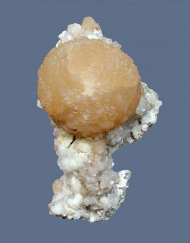 Stilbite
Summit Quarry, Springfield, Union County, New Jersey, USA
6 x 4.5 cm
A 2.5 cm stilbite sphere with heulandite and prehnite (Author: Frank Imbriacco)