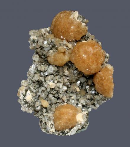 Stilbite and heulandite
Weldon Quarry, Watchung, Somerset County, New Jersey, USA
11.2 x 8.8 cm
Stilbite spheres to 3.5 cm with heulandite, albite, and calcite (Author: Frank Imbriacco)
