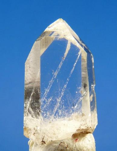 Quartz
Ceres, Western Cape, South Africa
18 x 10 x 06 mm
A fascinating and unusual quartz crystal with strange lines on both sides and top of crystal of, which appears to be microscopic bubbles, just beneath the surface. (Author: Pierre Joubert)