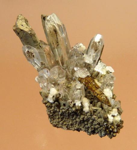 Calcite
N’Chwaning Mines, Kuruman, Kalahari manganese fields, Northern Cape, South Africa
35 x 23 mm
A most bizarre little specimen!  Clear calcite has overgrown, what appears to be, upside down calcite crystals, overcoated by some unknown mineral. (Author: Pierre Joubert)