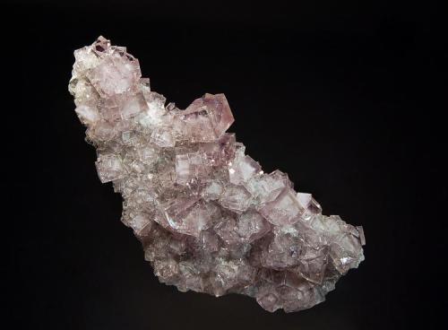 Fluorite
Blackdene Mine, Ireshopeburn, Weardale, Durham, England
5.2 x 10.5 cm.
Glassy pale lilac-colored crystals to 1.2 cm on limestone matrix. (Author: crosstimber)