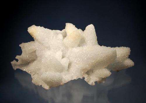 Quartz casts after calcite
Droujba Mine, Laki District, Plovdiv Oblast, Bulgaria
7.1 x 10.0 cm.
Scalenohedral calcite crystals to 3.5 cm. epimorphed by quartz. The calcite has been completely dissolved away leaving thin hollow shells. (Author: crosstimber)