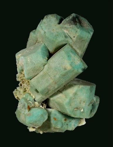 Microcline (v. Amazonite) -- before cleaning
Lake George area, Park County, Colorado, USA

130 x 124 x 104 mm

Classic, old-time Colorado Amazonite with sharp, light greenish-blue, blocky crystals of Microcline, on a matrix of white Albite (v. Cleavlandite). The Amazonites are well formed and fully terminated, several of which are well-developed twins. One crystal has a "slot" where it once enclosed a blade of what was likely Cleavlandite. This is an old AE Foote specimen, and was later sold by Filer’s (Redlands, CA) and the Bradleys (Los Angeles). Formerly in the Don Boydston and Joel D. Cohen collections. It is complete on all sides, unrepaired and has no damage. (Author: GneissWare)