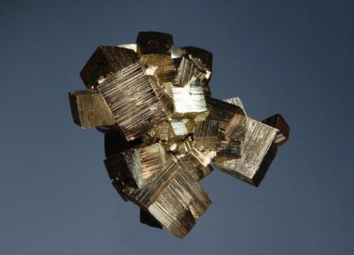 Pyrite
Mogila deposit, Septemvri Mine, Madan District, Smolyan Oblast, Bulgaria
4.3 x 6.1 cm
Heavily striated cubic crystals to 2.5 cm. (Author: crosstimber)