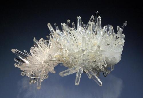 Quartz
Kruchev dol Mine, Madan Orefield, Smolyan Oblast, Bulgaria
5.0 x 7.1 cm.
An undamaged group of slender transparent quartz crystals mined in 2008. (Author: crosstimber)