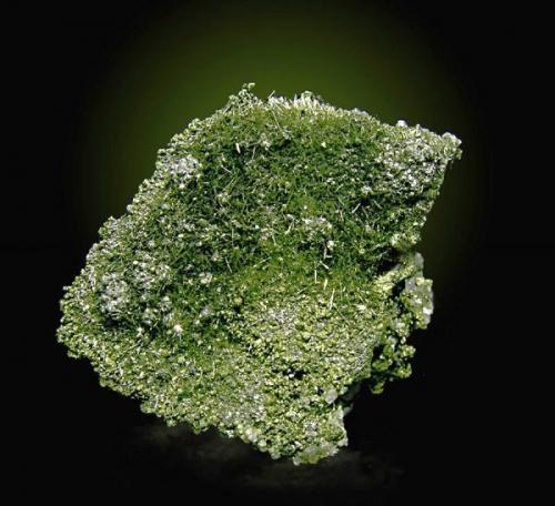 Millerite and Siegenite. Eugènia Mine.
Specimen size: 4 x 3,5 x 3,5 cm. 
Jordi Fabre Collection.
Fabre Minerals Photo. (Author: Joan Rosell)
