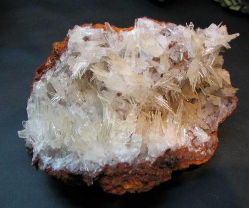 Aragonite group.  Fairly unusual to see specimens of this, although it is probably common in parts of the mine.  12 cm across (Author: Peter Megaw)