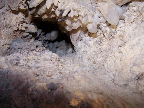 A pocket of quartz crystals is found high up in the mountains.  Robertson, WC. (Author: Pierre Joubert)