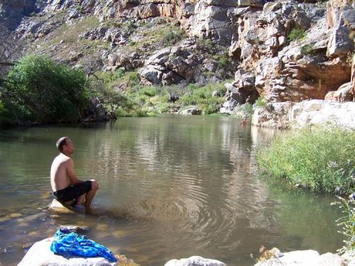 It gets really hot up in these mountains and here we are taking a break from digging for crystals.  Robertson, WC. (Author: Pierre Joubert)