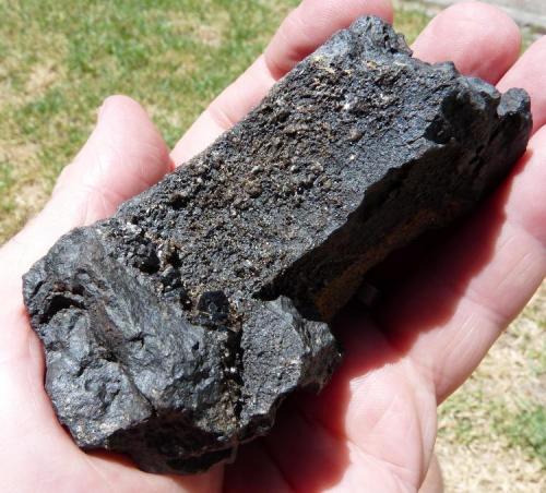 Iron bearing rock with strange crystals.
Western Cape, South Africa
85 x 52 mm
This black rock hosts some dark unknown crystals of a type I have never seen from this area. (Author: Pierre Joubert)