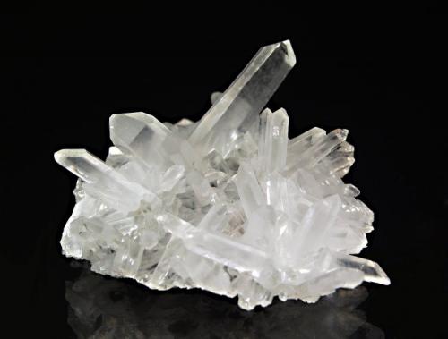 Quartz
Kruchev dol Mine, Madan District, Smolyan Oblast, Bulgaria
5.5 x 7.2 cm.
A flat quartz plate with a couple of Japan Law twins mined in 2007. (Author: crosstimber)