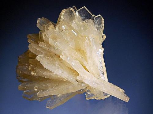Barite
Gheturi Mine, Turt, Satu Mare, Romania
5.5 x 6.1 cm.
Fan-shaped cluster of pale yellow barite crystals with transparent terminations.  Mined in 2000. (Author: crosstimber)