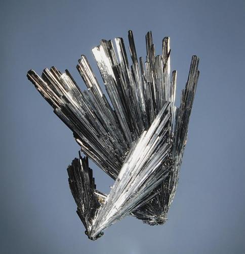Stibnite
Herja Mine, Baia Mare, Maramures Romania
4.8 x 6.3 cm.
Interconnected fan-shaped sprays of steel-gray stibnite with low angled terminations. (Author: crosstimber)