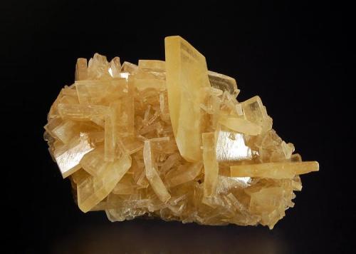 Barite
Roata Mine, Cavnic, Maramures, Romania
4.0 x 6.5 cm.
Straw-yellow, bladed barite crystals. Mined in 1996. (Author: crosstimber)