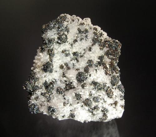 Chalcostibite
Boldut Mine, Cavnic, Maramures, Romania
8.5 x 9.0 cm.
Sharp, bladed aggregates of dark gray, metallic chalcostibite with minor
tetrahedrite on a quartz matrix. Collected from a single find at this location in 2000. (Author: crosstimber)