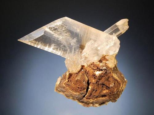 Gypsum
Boldut Mine, Cavnic, Maramures, Romania
8.0 x 9.0 cm.
Colorless, transparent crystals to 8.0 cm in length on light brown siderite. Collected in 1990. (Author: crosstimber)