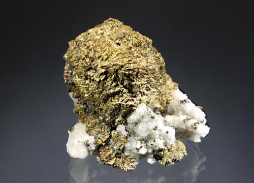 Chalcopyrite
Boldut Mine, Cavnic, Maramures, Romania
5.8 x 6.9 cm
A spherical aggregate of brassy chalcopyrite with quartz accents. Collected in 2004. (Author: crosstimber)